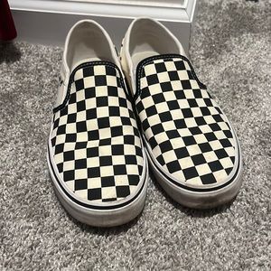 Black and cream checkered vans